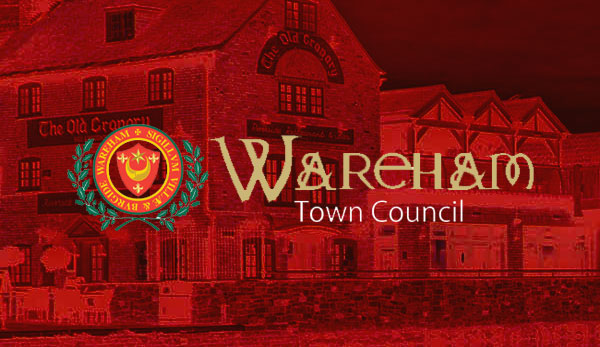 Wareham Town Council crest over The Old Granary building in Wareham
